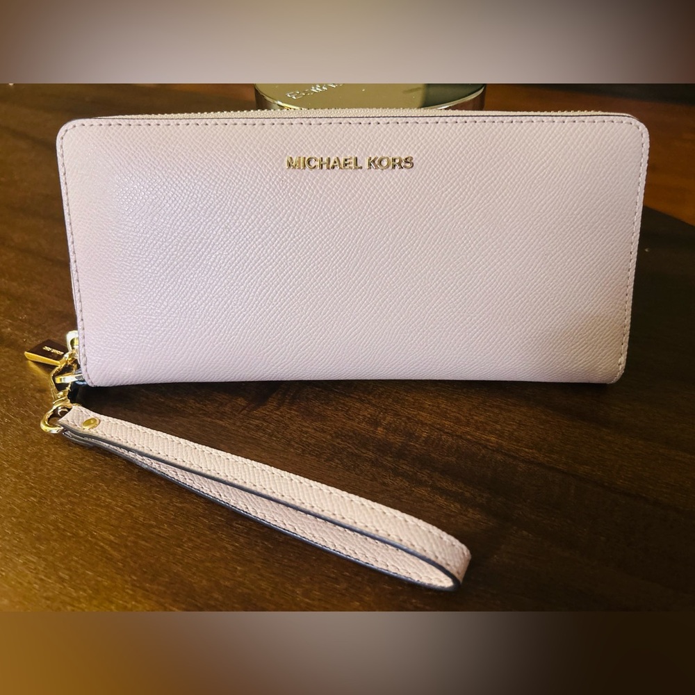 Genuine leather MK wristlet. Authentic- never used.